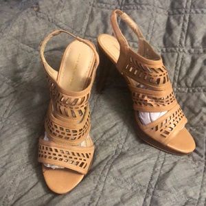 Nude cutout sling back heels.